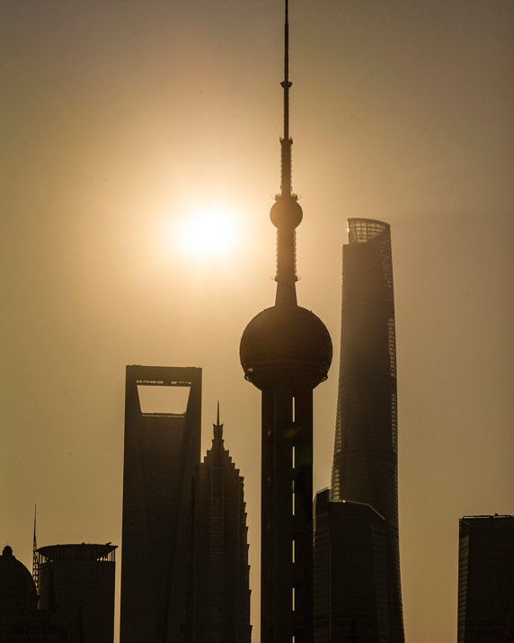 Shanghai's Pudong District's skyscrapers in the morning, Oriental Pearl Tower, Shanghai World Financial Center, Shanghai Tower, and Jin Mao Tower