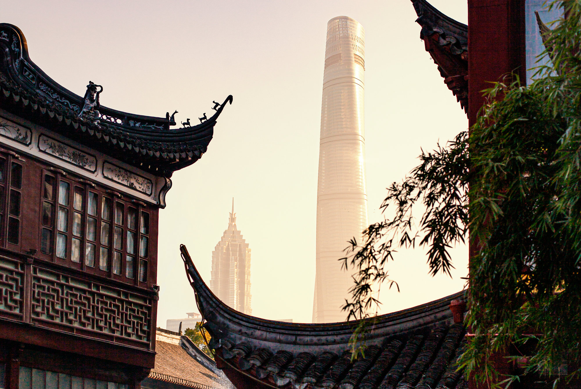 Modern skyscrapers in Shanghaiâ  s Pudong District contrasted with traditional buildings in Yu Garden (è±«å ­)