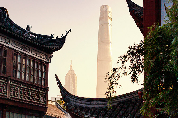 Modern skyscrapers in Shanghaiâ  s Pudong District contrasted with traditional buildings in Yu Garden (è±«å ­)