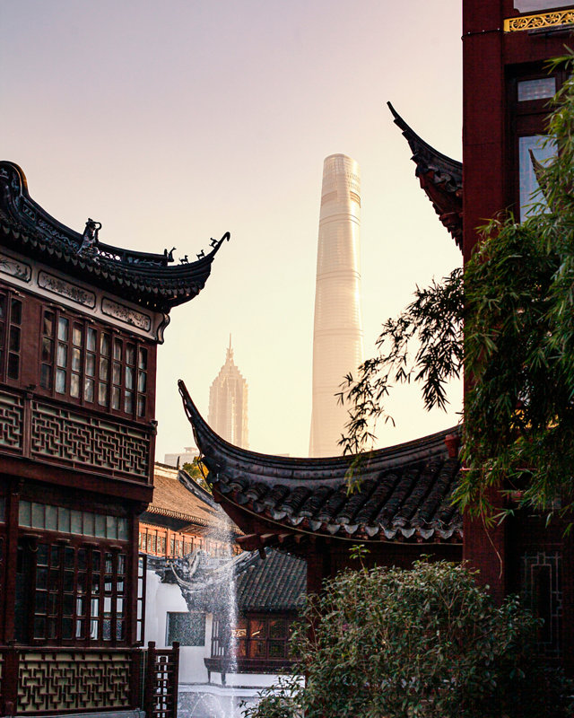 Modern skyscrapers in Shanghaiâ  s Pudong District contrasted with traditional buildings in Yu Garden (è±«å ­)