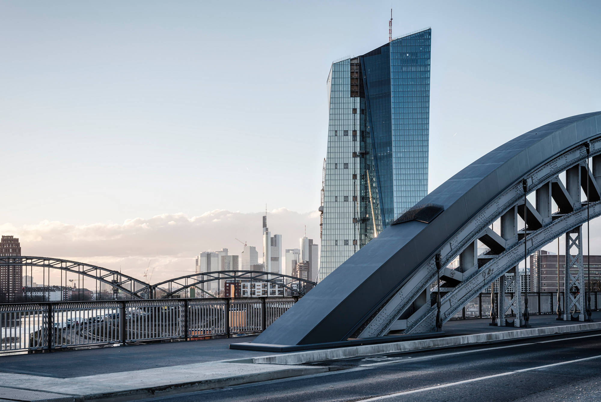 The new European Central Bank (ECB) Building in the East end of Frankfurt in front of the skyline, Germany. Toned picture. January 2014.