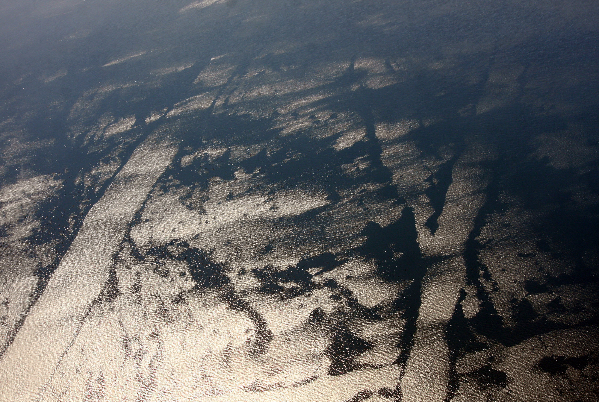 Aerial photo showing the coastal landscape of Banten province, on the north coast of Java Island, Indonesia.  Here are a few of the Thousand Islands (Pulau Seribu) which lie off the north coast of West Java.