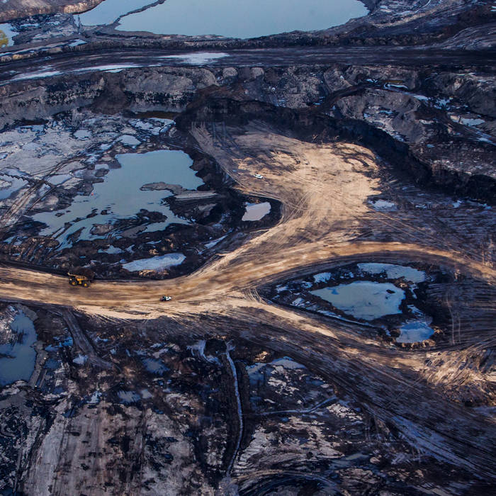 Aerial view of the Athabasca oil sands near Fort McMurray, Alberta, Canada. Photographer: Ben Nelms/Bloomberg