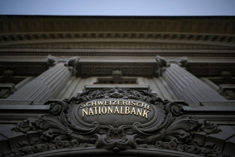 A picture taken on August 15, 2022 shows a sign of the Swiss National Bank (SNB BNS) at their headquarters in the Swiss capital Bern. (Photo by Fabrice COFFRINI / AFP) (Photo by FABRICE COFFRINI/AFP via Getty Images)