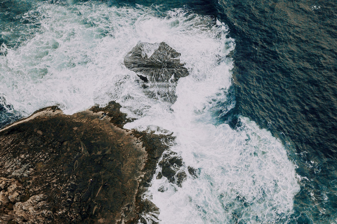 waves hitting rocks