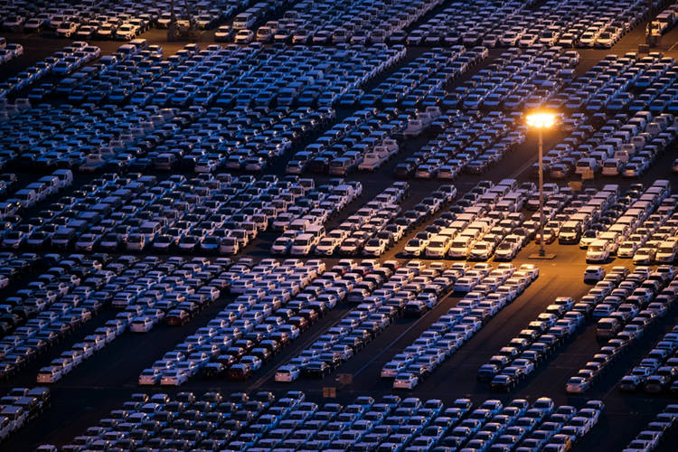 Vehicles bound for export await shipment in South Korea. 