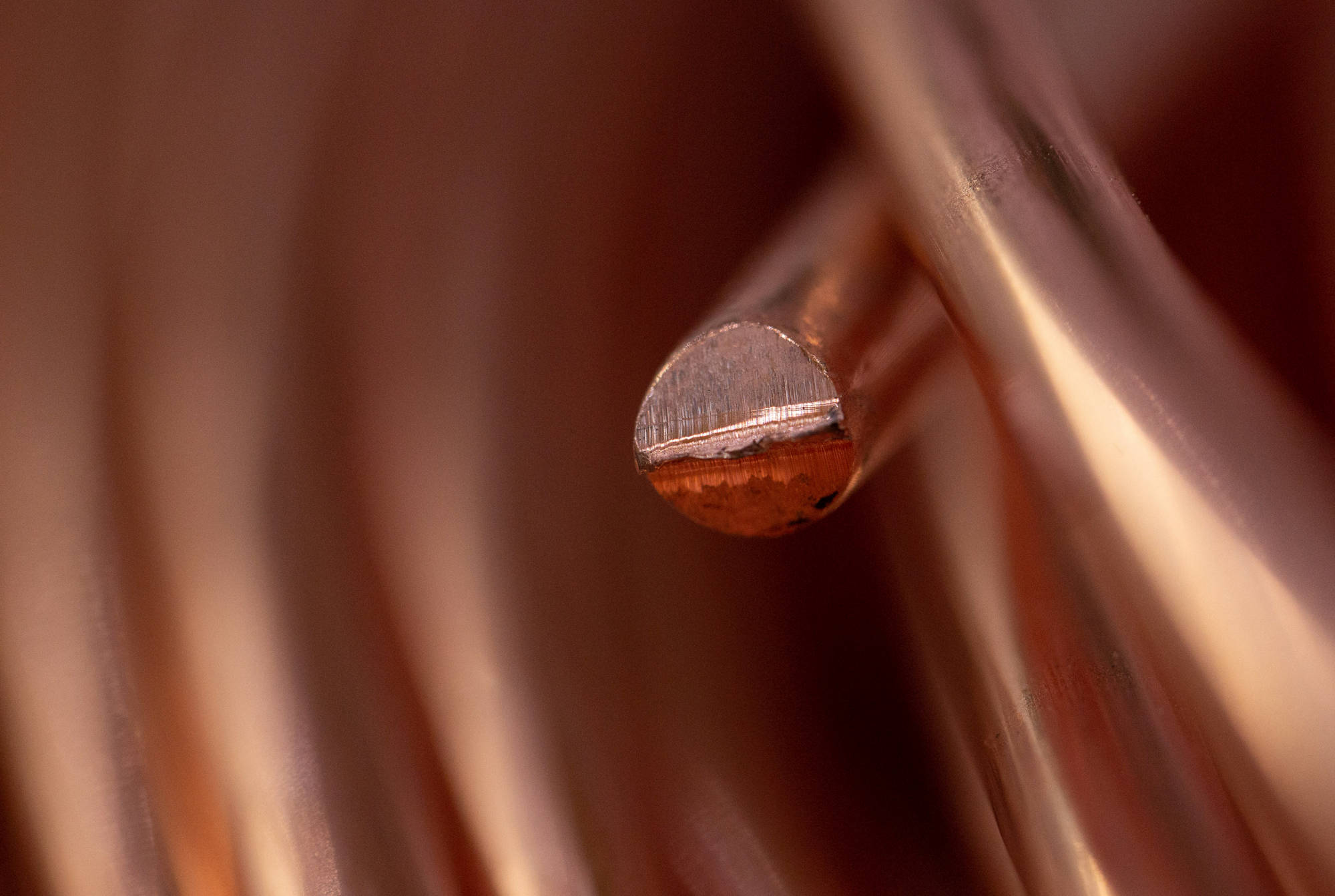 The cut tip of a copper wire rod. Photographer: Andrey Rudakov/Bloomberg