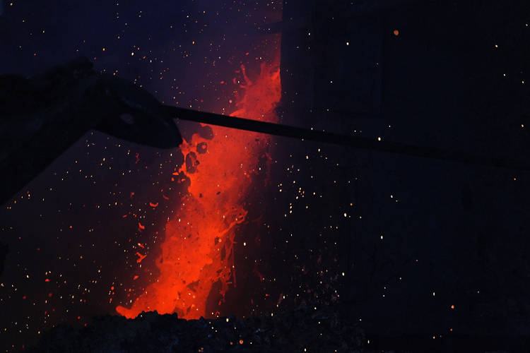 Red-hot molten tin poured during casting. Photographer: Dimas Ardian/Bloomberg