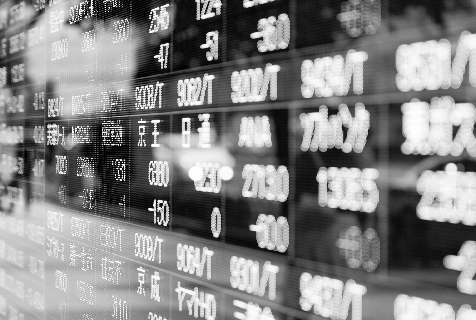 Stock market movements shown on an electronic display in Japan. Photographer: Kiyoshi Ota/Bloomberg